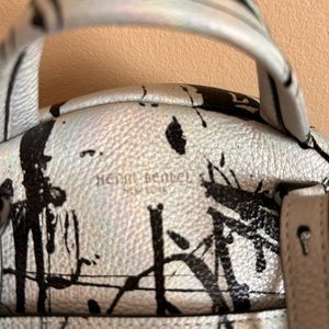 Henri Bendel iridescent paint splatter backpack